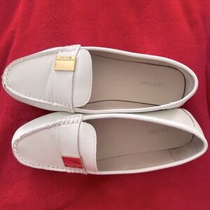 Calvin Klein White Leather Loafer, 8.5. Some discoloration on left toe pictured